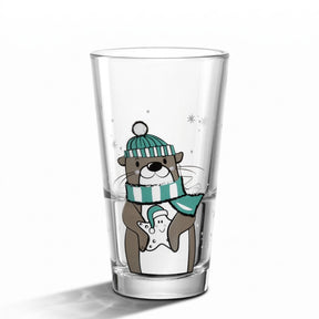 Trinkglas RIPOSO mit Otter-Motiv, grüne Mütze und Schal, Schneeflocken
