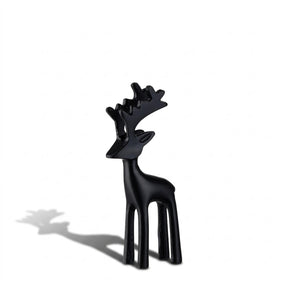 Hirsch RIPOSO 16 cm schwarz, Dekofigur vor weißem Hintergrund mit Schatten