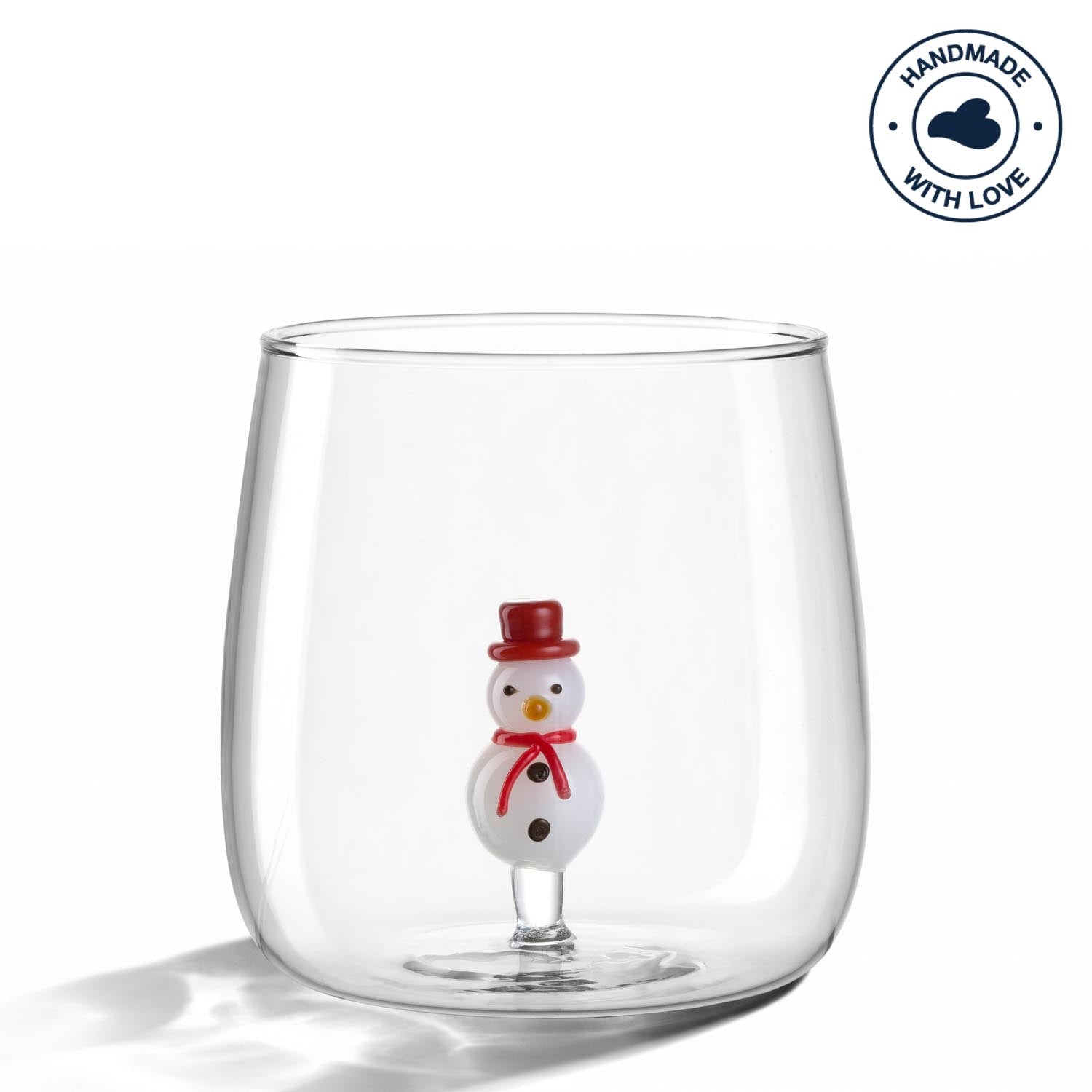 Trinkglas RIPOSO mit Schneemann-Figur am Boden, klares Glas, Studioaufnahme