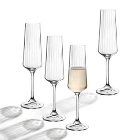 Sektglas PAOLO 220 ml 4er-Set, drei leere und ein mit Prosecco gefülltes Glas