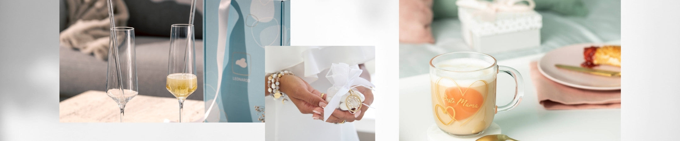 Sektgläser neben Geschenkbox sowie Tasse mit Herzmotiv und Geschenk mit Schmuckanhänger in der Hand.